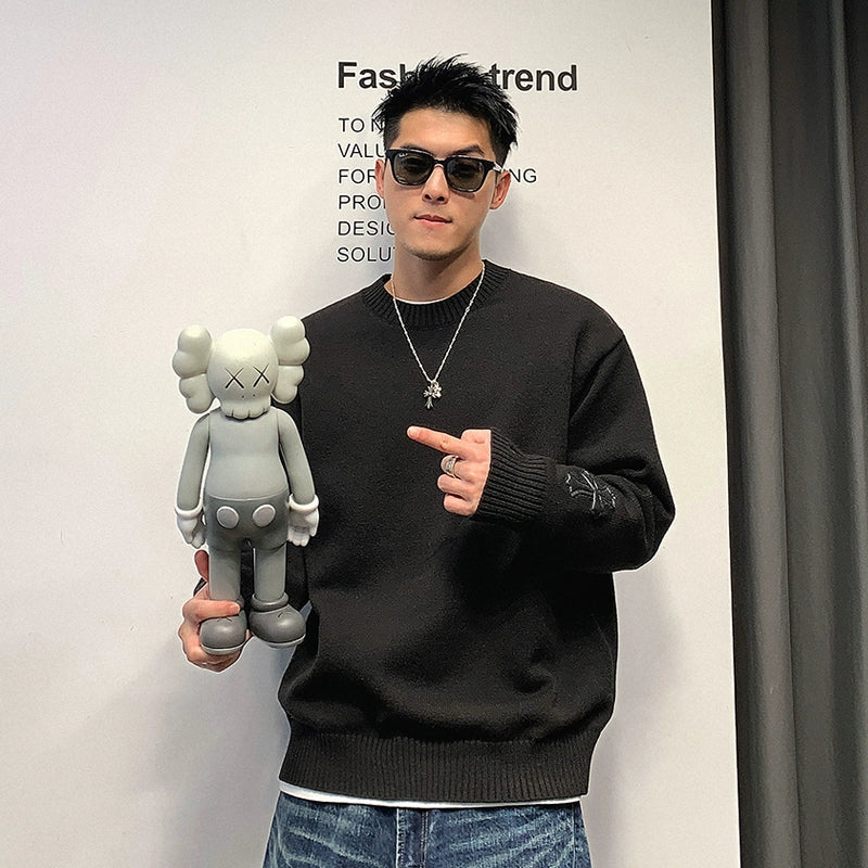 Cross motif knit sweater