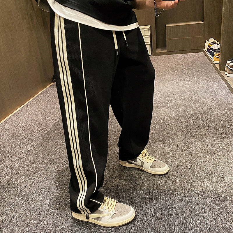 Three Stripe Loose Fit Sweatpants 