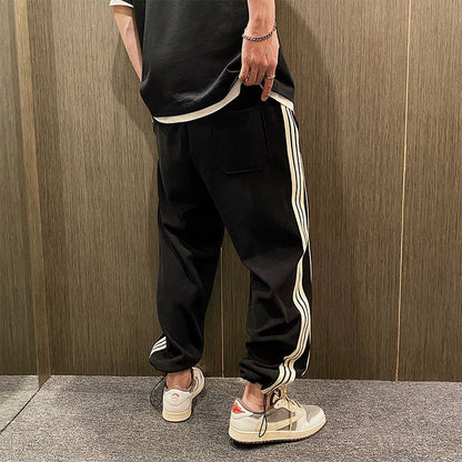 Three Stripe Loose Fit Sweatpants 